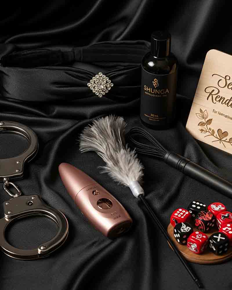 Sensual pack with various items on a black silk background